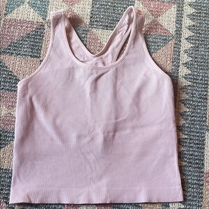 Girls Ribbed Light Pink sports top.
